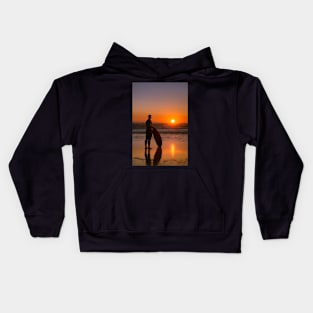 Surfer watching the waves Kids Hoodie